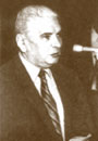 A person wearing a suit and tie Description automatically generated with medium confidence