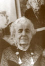 A picture containing text, person, mammal Description automatically generated